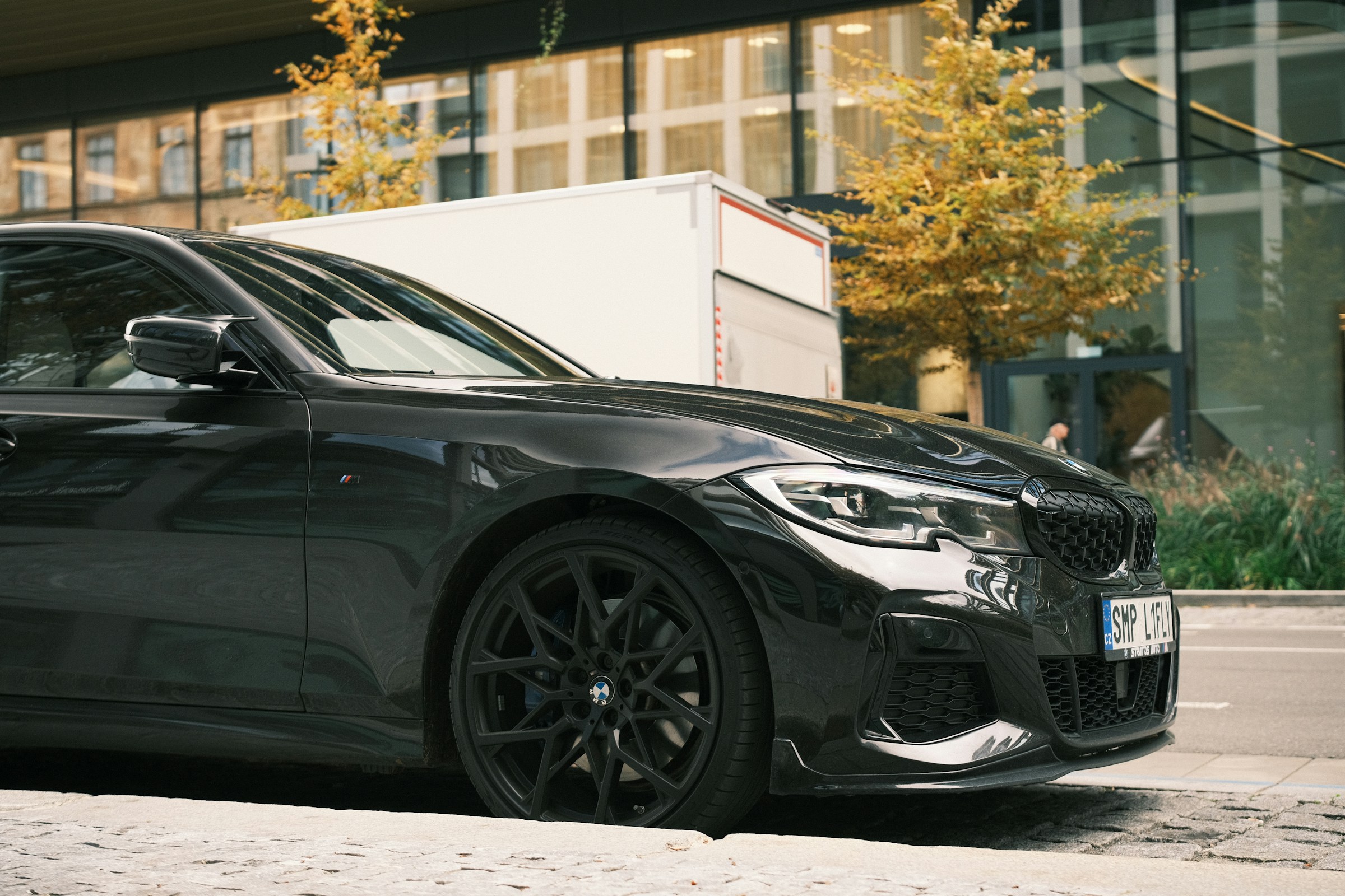 Black sedan—Smogery vehicle pickup and smog testing